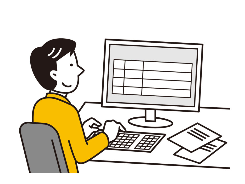 経理事務をする男性